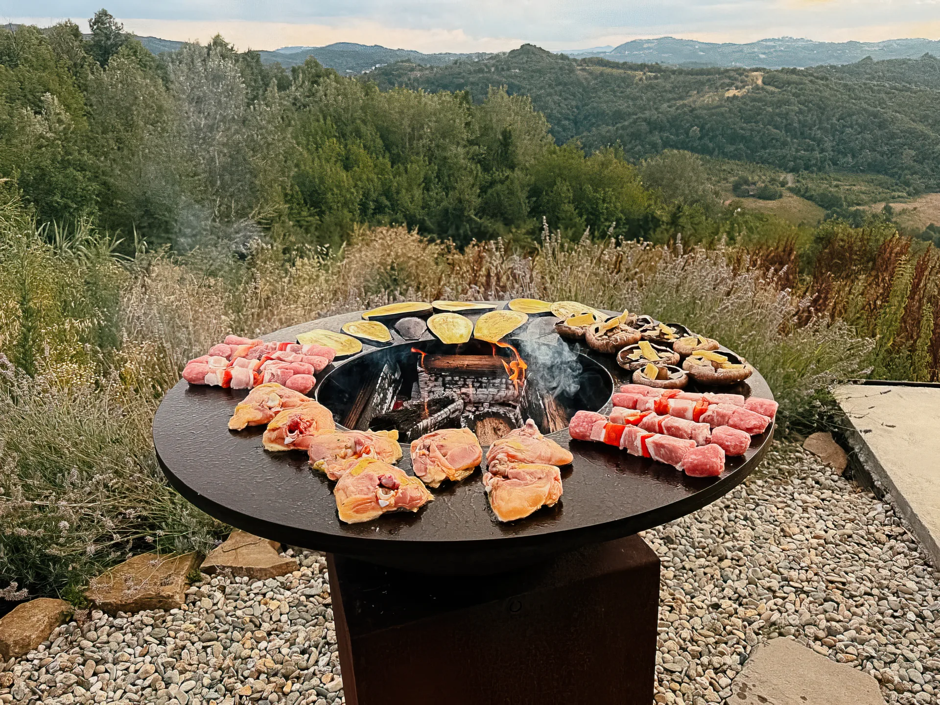 Cooking at the fire, the valley beyond